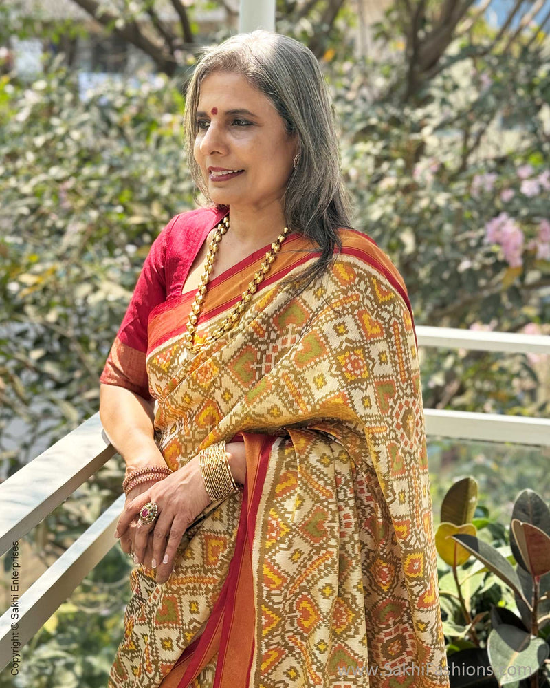EE-W18718 Tissue Cream Patola Sari